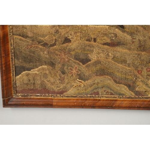 1474 - AN 18TH CENTURY WOOL AND SILK TAPESTRY PANEL. probably English, depicting a hunting scene of  figure... 