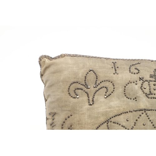 1482 - A 17TH CENTURY COMMEMORATIVE SILK CUSHION. decorated with steel pins forming the date 1674 above a c... 