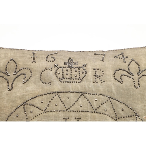 1482 - A 17TH CENTURY COMMEMORATIVE SILK CUSHION. decorated with steel pins forming the date 1674 above a c... 