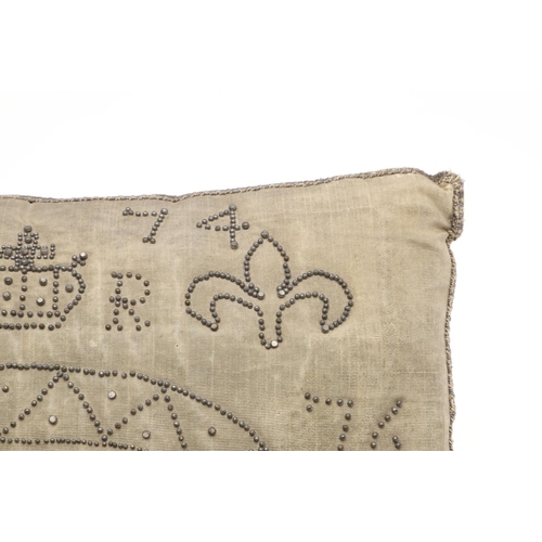 1482 - A 17TH CENTURY COMMEMORATIVE SILK CUSHION. decorated with steel pins forming the date 1674 above a c... 