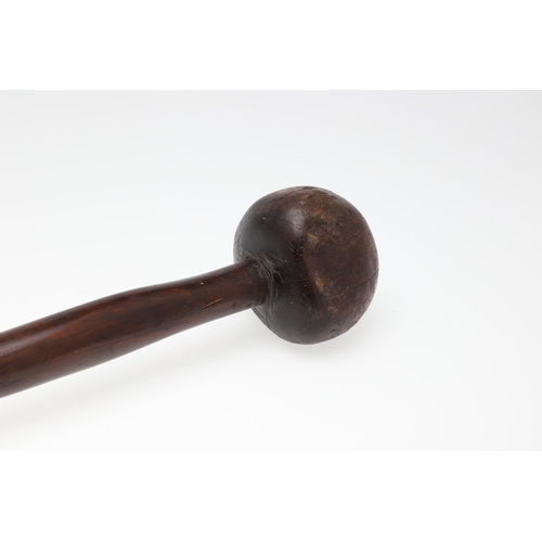 1490 - AN AFRICAN TRIBAL HARDWOOD KNOBKERRIE. length 68cm.  *CR  Splits and wear to head, general wear to s... 