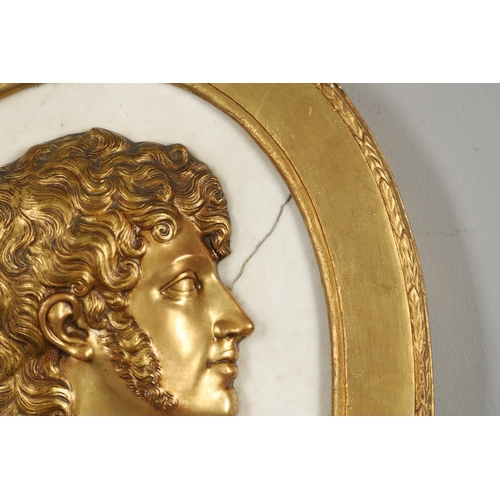 1491 - A 19TH CENTURY OVAL MARBLE AND GILT METAL PORTRAIT PLAQUE. the white marble mounted with a head of a... 