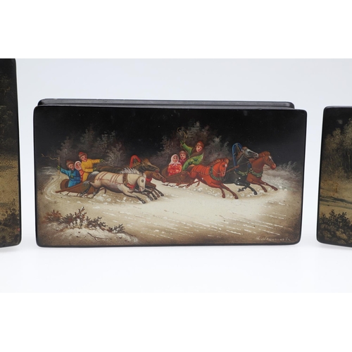 1493 - A GROUP OF 19TH CENTURY AND LATER RUSSIAN LACQUERED PAPIER-MACHE BOXES. each lid depicting a scene o... 