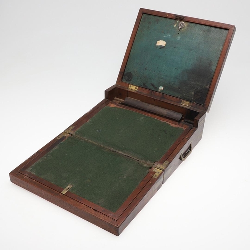 1494 - A 19TH CENTURY MAHOGANY AND BRASS BOUND WRITING SLOPE. in the Campaign style with recessed side hand... 