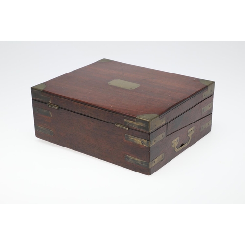 1494 - A 19TH CENTURY MAHOGANY AND BRASS BOUND WRITING SLOPE. in the Campaign style with recessed side hand... 