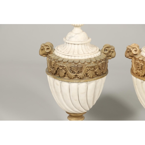 1496 - A PAIR OF REGENCY STYLE RESIN URNS AND COVERS. the lobed bodies with gold painted swag and acanthus ... 