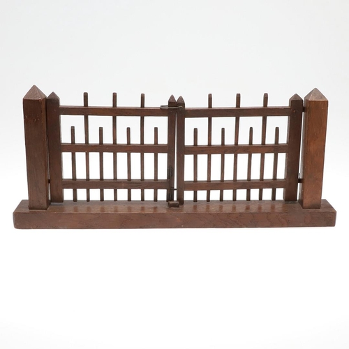 1502 - A PAIR OF ARTS AND CRAFTS MINIATURE OAK GATES. possibly an apprentice piece, the double gates fitted... 