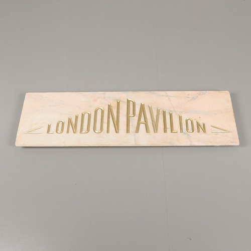 1503 - A PALE PINK MARBLE 'LONDON PAVILION' PLAQUE. the carved lettering in gilt, height 38cm, length 130cm... 