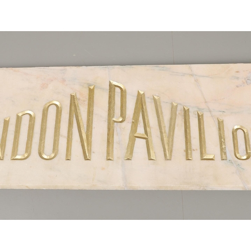 1503 - A PALE PINK MARBLE 'LONDON PAVILION' PLAQUE. the carved lettering in gilt, height 38cm, length 130cm... 