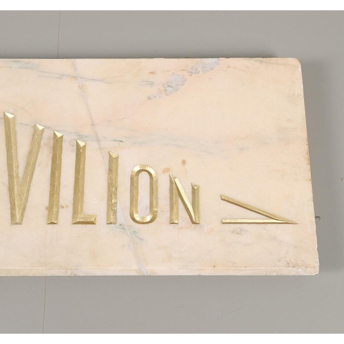 1503 - A PALE PINK MARBLE 'LONDON PAVILION' PLAQUE. the carved lettering in gilt, height 38cm, length 130cm... 