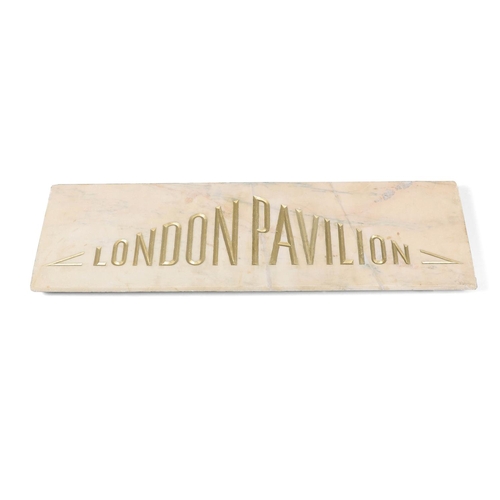 1503 - A PALE PINK MARBLE 'LONDON PAVILION' PLAQUE. the carved lettering in gilt, height 38cm, length 130cm... 