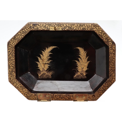 1506 - A CHINESE EXPORT BLACK LACQUERED AND GILT TEA CADDY. of octagonal form with gilt Chinoiserie decorat... 