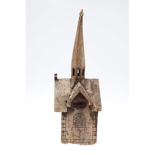 1507 - FOLK ART: A CONTINENTAL CARVED ELM (?) CHURCH. dated 1881 and initialled D.A.F.P, with penwork Roman... 