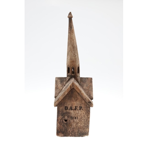 1507 - FOLK ART: A CONTINENTAL CARVED ELM (?) CHURCH. dated 1881 and initialled D.A.F.P, with penwork Roman... 