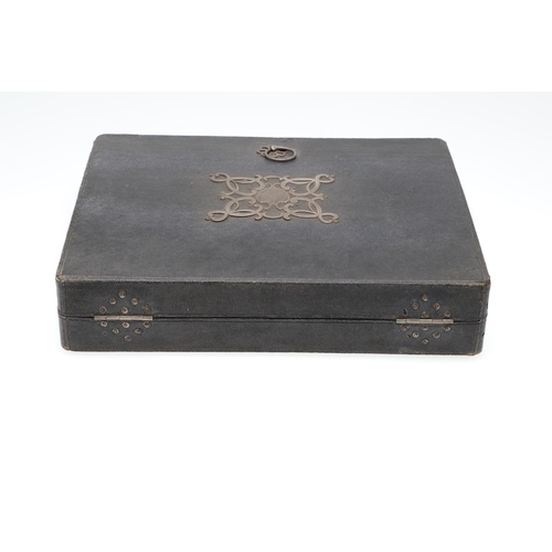 1508 - A GEORGE III SHAGREEN WRITING CASE. the lid with elaborate steel mount and crest, enclosing an arran... 