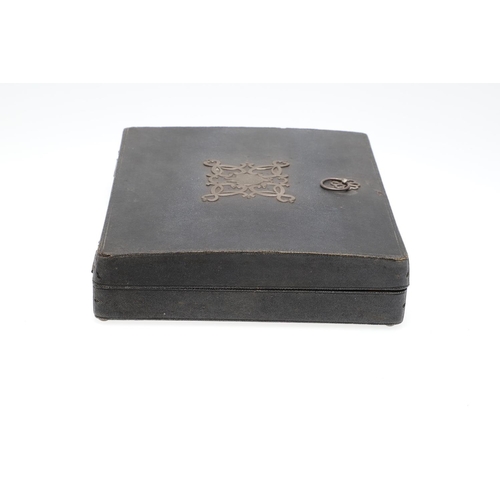 1508 - A GEORGE III SHAGREEN WRITING CASE. the lid with elaborate steel mount and crest, enclosing an arran... 