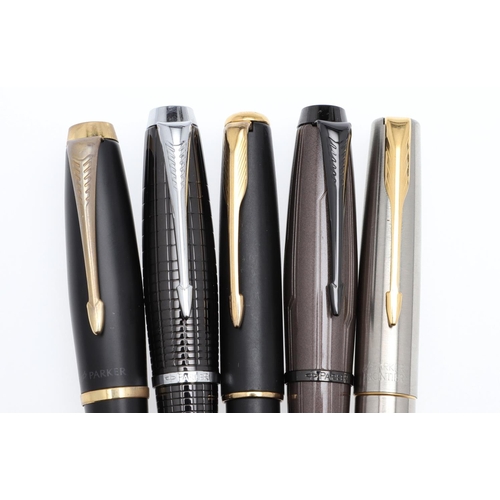 1510 - A COLLECTION OF PARKER FOUNTAIN PENS. including a matt black example, pink bodied example and a purp... 