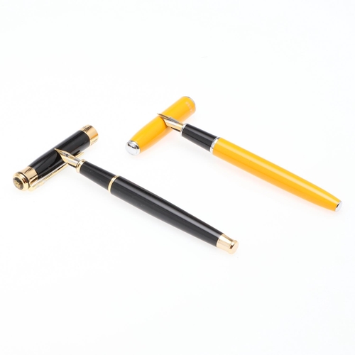 1520 - PICASSO: TWO CONTEMPORARY FOUNTAIN PENS. the yellow cased pen with 22k nib, the black cased pen with... 