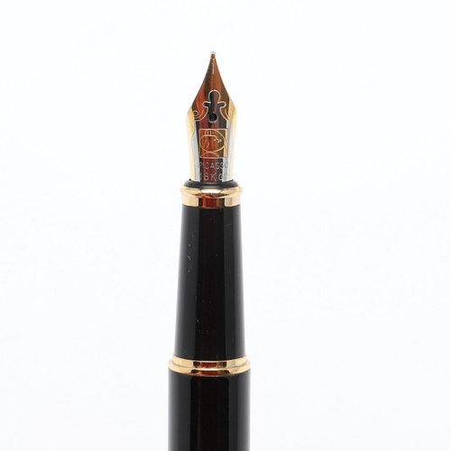 1520 - PICASSO: TWO CONTEMPORARY FOUNTAIN PENS. the yellow cased pen with 22k nib, the black cased pen with... 