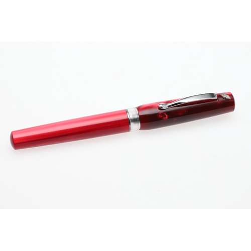 1525 - A STIPULA FOUNTAIN PEN. with ruby pink celluloid body, white metal clip and leaf emblem, clear ink r... 