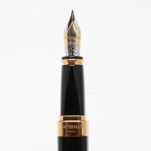 1529 - A WATERMAN 'IDEAL' BLACK AND GILT METAL CASED FOUNTAIN PEN. the case of square form, engraved Waterm... 