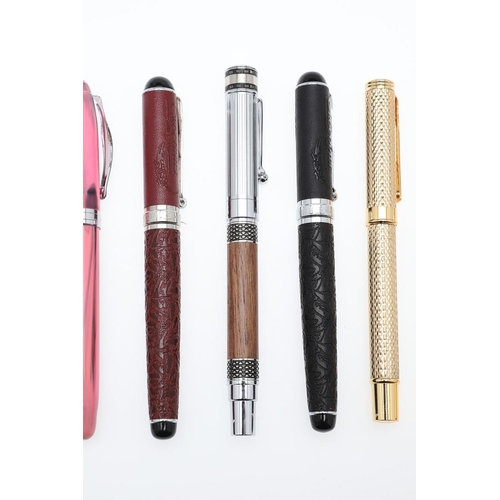 1532 - A GROUP OF ASSORTED MODERN FOUNTAIN PENS. comprising two Noodler's Ink pens in striated pink and ora... 