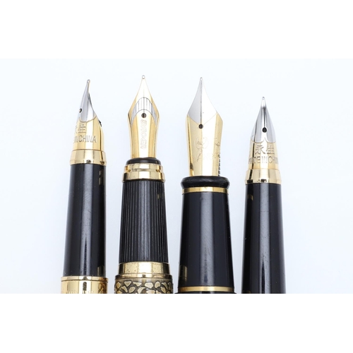 1537 - A GROUP OF CHINESE FOUNTAIN PENS. including makers Baoer and Kaiduoli, with black, gold tone and red... 