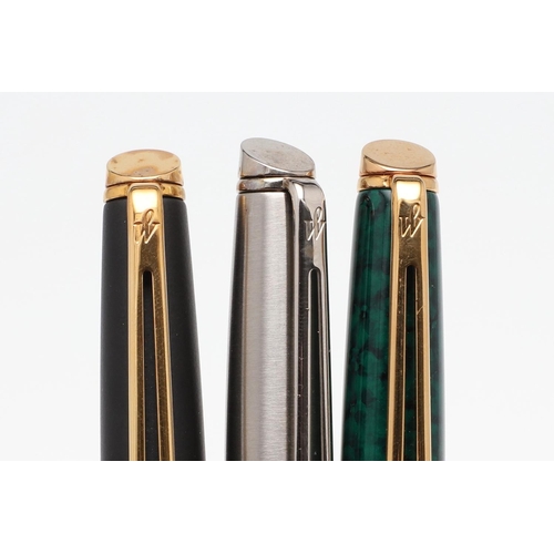 1540 - THREE WATERMAN FOUNTAIN PENS. comprising: a Hemisphere green bodied pen, a brushed steel cased pen a... 