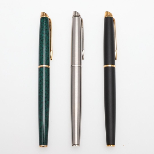 1540 - THREE WATERMAN FOUNTAIN PENS. comprising: a Hemisphere green bodied pen, a brushed steel cased pen a... 