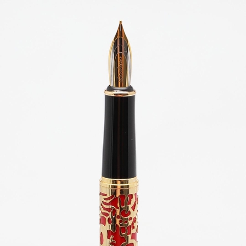 1542 - JINHAO: TWO FOUNTAIN PENS. model 5000, each decorated with gold coloured metal dragon overlay to red... 