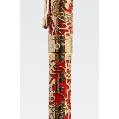 1542 - JINHAO: TWO FOUNTAIN PENS. model 5000, each decorated with gold coloured metal dragon overlay to red... 