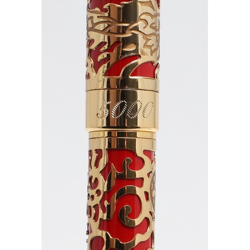 1542 - JINHAO: TWO FOUNTAIN PENS. model 5000, each decorated with gold coloured metal dragon overlay to red... 