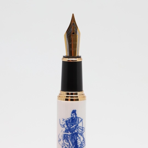 1544 - JINHAO: TWO FOUNTAIN PENS. decorated with figures of Chinese warriors and flowering plants in blue t... 