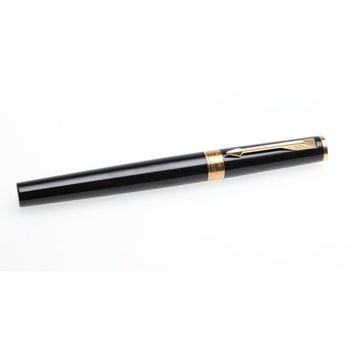 1547 - A MODERN PARKER SONNET FOUNTAIN PEN. with red barrel and cap, gold plated mounts and arrow clip, the... 