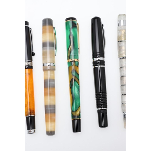 1548 - A GROUP OF GERMAN FOUNTAIN PENS. comprising a 'Romet' pen with marbled green and yellow body, the ni... 