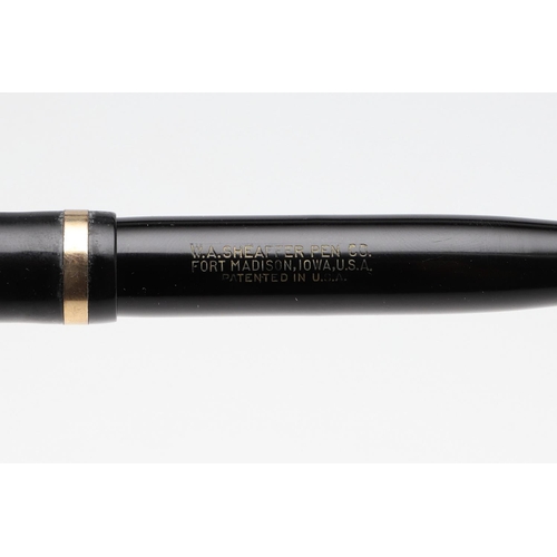 1550 - SHEAFFER: 1940S BLACK CELLULOID FOUNTAIN PEN. the lever filled body stamped W A Sheaffer Pen Co. For... 