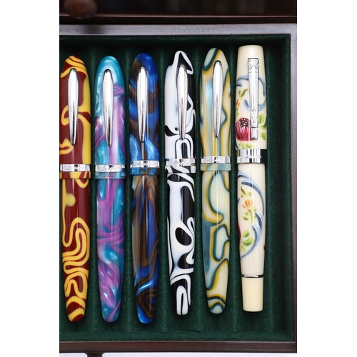 1553 - A COLLECTION OF MODERN LABAN FOUNTAIN PENS. with multi-coloured marbled and other decorative resin b... 