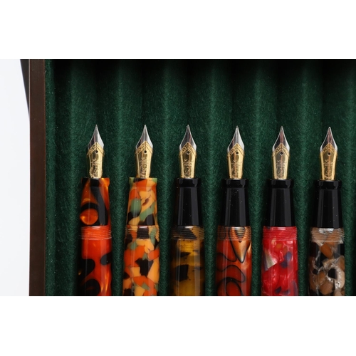 1553 - A COLLECTION OF MODERN LABAN FOUNTAIN PENS. with multi-coloured marbled and other decorative resin b... 