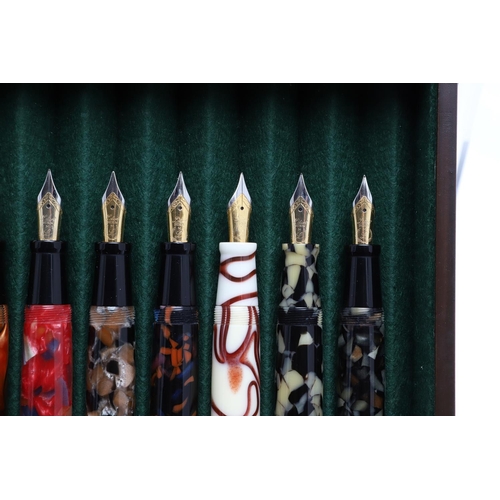 1553 - A COLLECTION OF MODERN LABAN FOUNTAIN PENS. with multi-coloured marbled and other decorative resin b... 