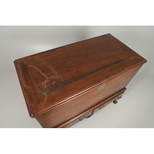 1559 - A 19TH CENTURY MAHOGANY DOWER CHEST ON STAND. the hinged lid enclosing a vacant interior, brass carr... 