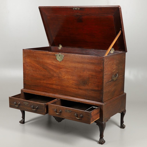 1559 - A 19TH CENTURY MAHOGANY DOWER CHEST ON STAND. the hinged lid enclosing a vacant interior, brass carr... 