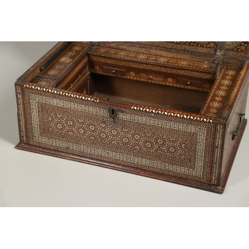 1563 - A NORTH AFRICAN BONE INLAID HARDWOOD TRAVELLING CHEST. circa 1800, profusely inlaid with bone diamon... 