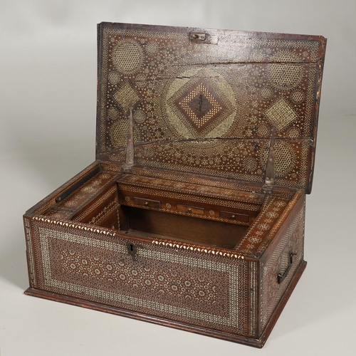 1563 - A NORTH AFRICAN BONE INLAID HARDWOOD TRAVELLING CHEST. circa 1800, profusely inlaid with bone diamon... 