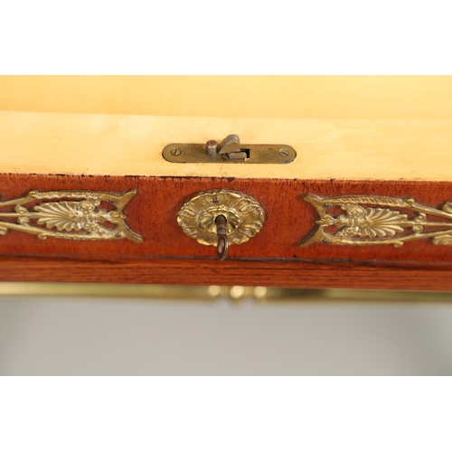 1567 - A FRENCH EMPIRE STYLE MAHOGANY AND BRASS SIDE/WRITING TABLE, CIRCA 1900. with a hinged lid opening t... 