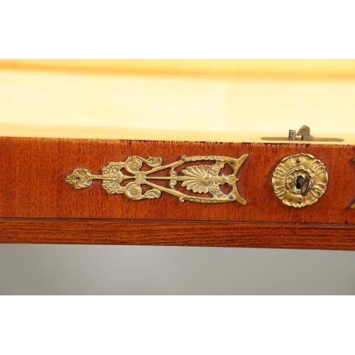 1567 - A FRENCH EMPIRE STYLE MAHOGANY AND BRASS SIDE/WRITING TABLE, CIRCA 1900. with a hinged lid opening t... 