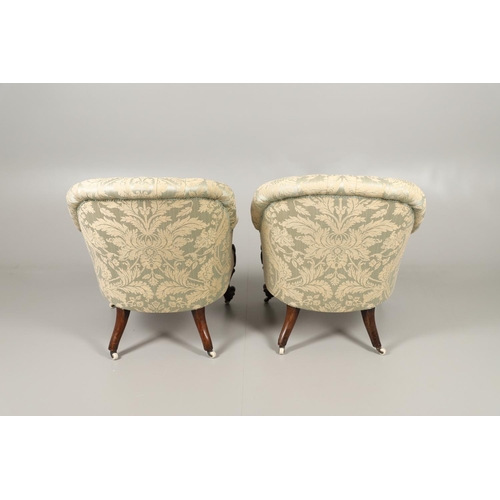 1569 - A PAIR OF MAHOGANY SHOW FRAME BUTTON BACK ARMCHAIRS. 19th century, the scroll and flower carved fram... 