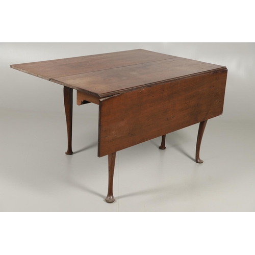 1570 - AN 18TH CENTURY AMERICAN WALNUT GATELEG TABLE. on cabriole legs with pad feet, maker's label to unde... 