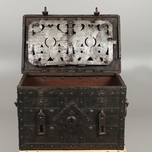 1571 - A 17TH CENTURY GERMAN 'ARMADA' IRON STRONG CHEST. the strapwork lid bearing traces of original green... 