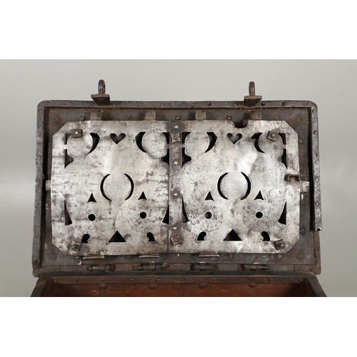 1571 - A 17TH CENTURY GERMAN 'ARMADA' IRON STRONG CHEST. the strapwork lid bearing traces of original green... 