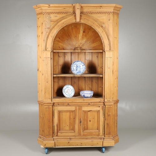 1572 - A PINE BARREL BACK ALCOVE CUPBOARD. the upper section with Classical architectural features to three... 